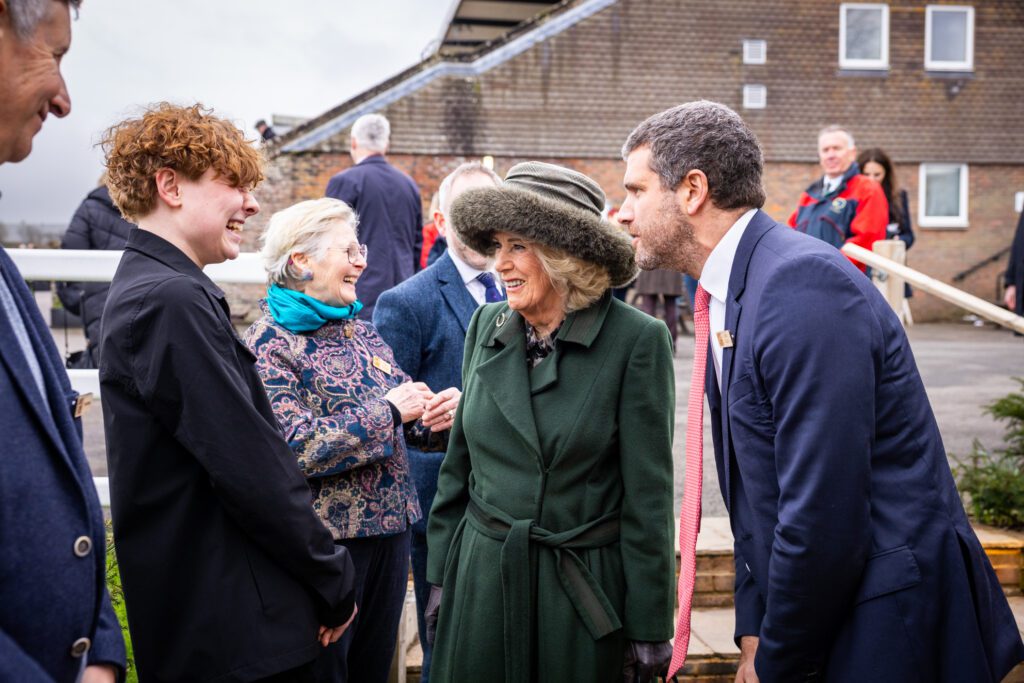 Her Majesty meeting a line up of Jamie's Farm staff and young people